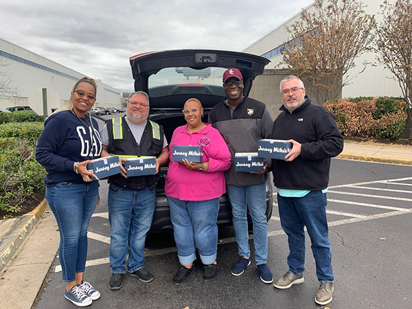 Crew delivering thanksgiving food